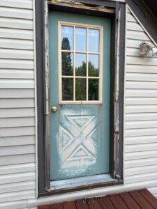 Worn out back door, no longer seals well and looks awful.