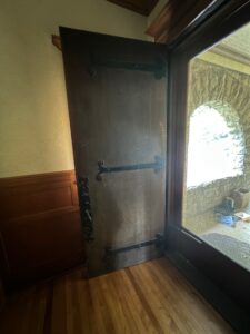 128 year old door in William Waters designed home in Oshkosh, WI and 128 years of exposure to Wisconsin weather shows.